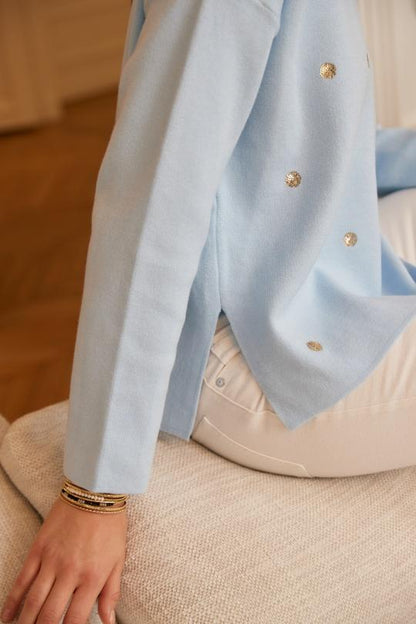 Pullover mit goldenen Tupfen