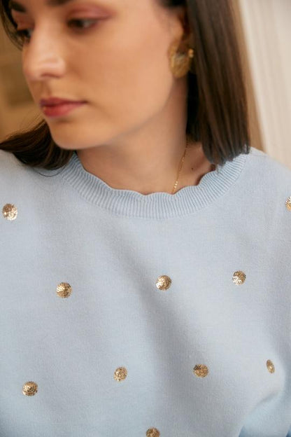 Pullover mit goldenen Tupfen