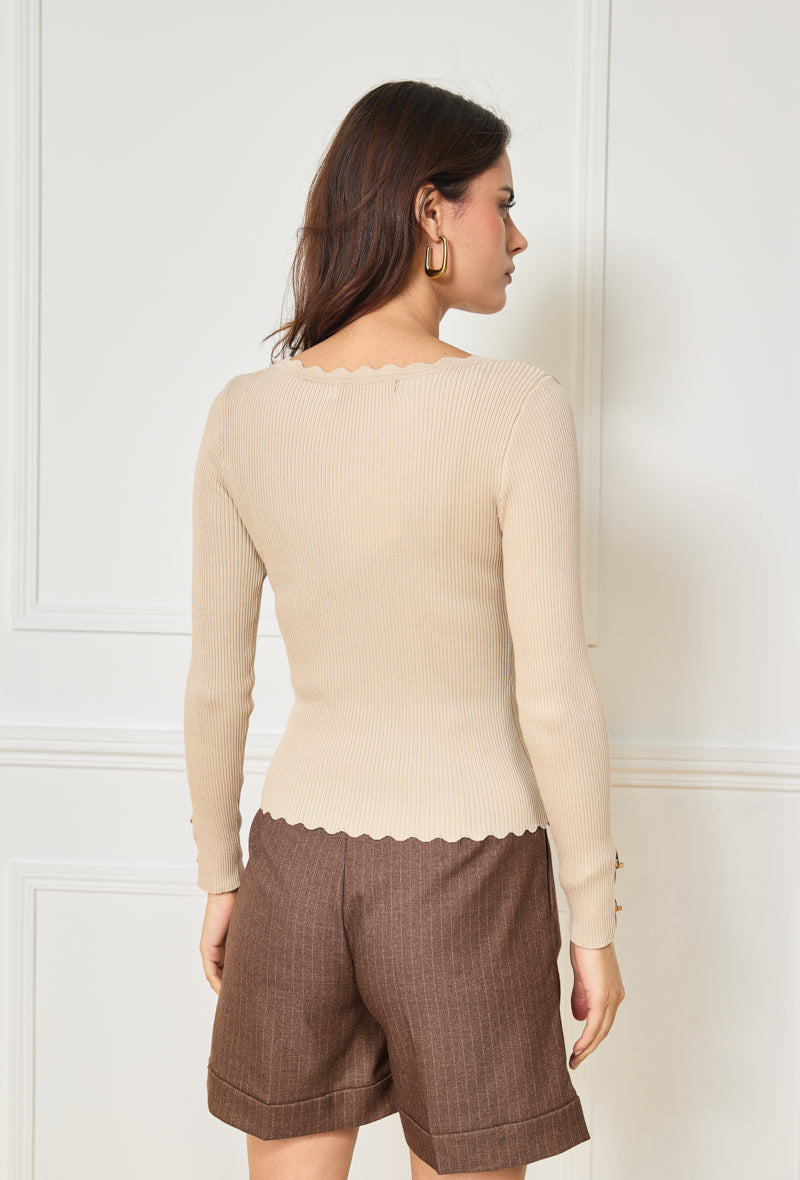 Pullover mit goldenen Details an den Ärmeln