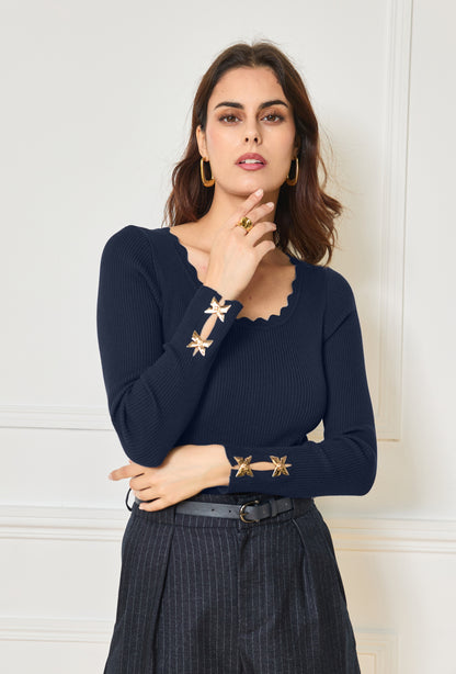Pullover mit goldenen Details an den Ärmeln
