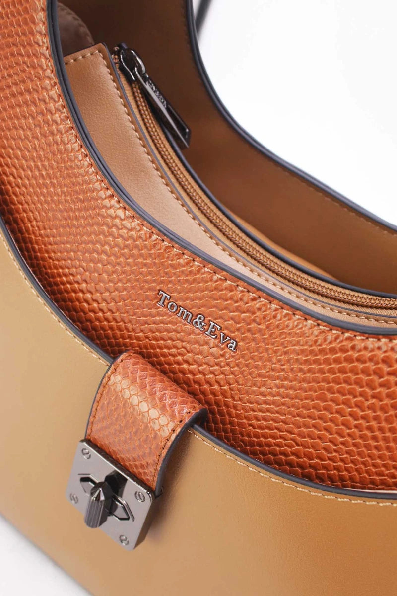 Elegante Schultertasche mit Drehverschluss